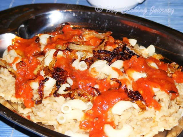 Koshari/Kushari (A popular Egyptian street food made of rice and lentil)