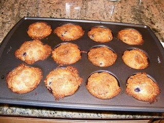 Blueberry Muffins in a muffin tray.
