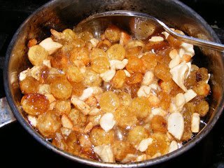 frying cashews and raisins