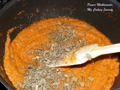 Adding kasoori methi on spices paste