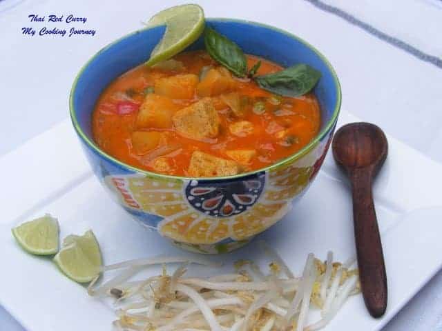 Thai Vegetable and tofu red curry is served in a bowl