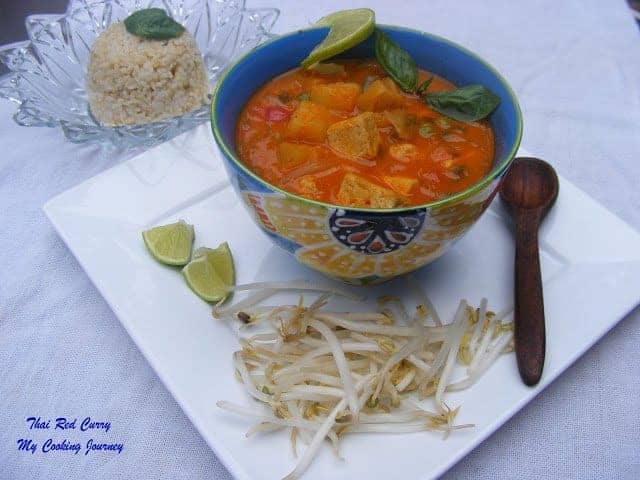 Thai Red Curry served with plate and spoon