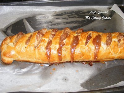 Apple Strudel putting in oven.