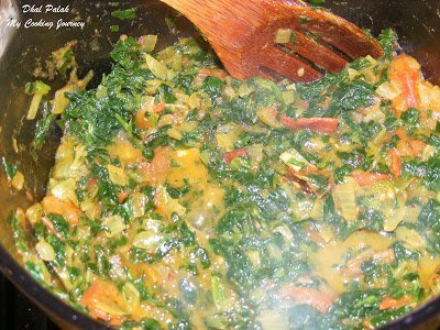 Cooking the dhal Palak in a pan