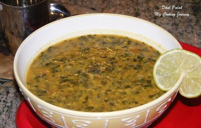 Dhal Palak garnish with lemon