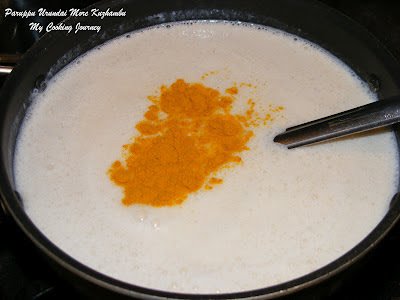 Boiling buttermilk with turmeric
