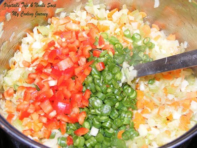 Add chopped vegetable in a stock pot