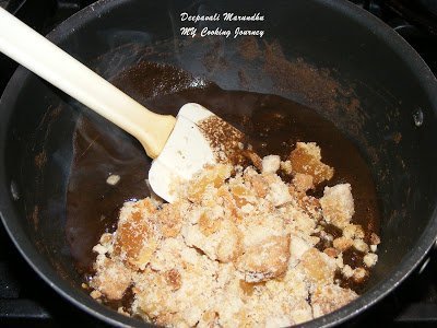 Adding Jaggery in mixture.
