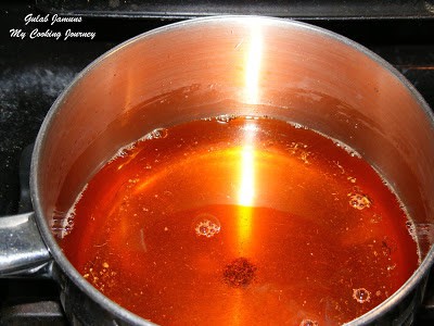 adding food coloring in syrup