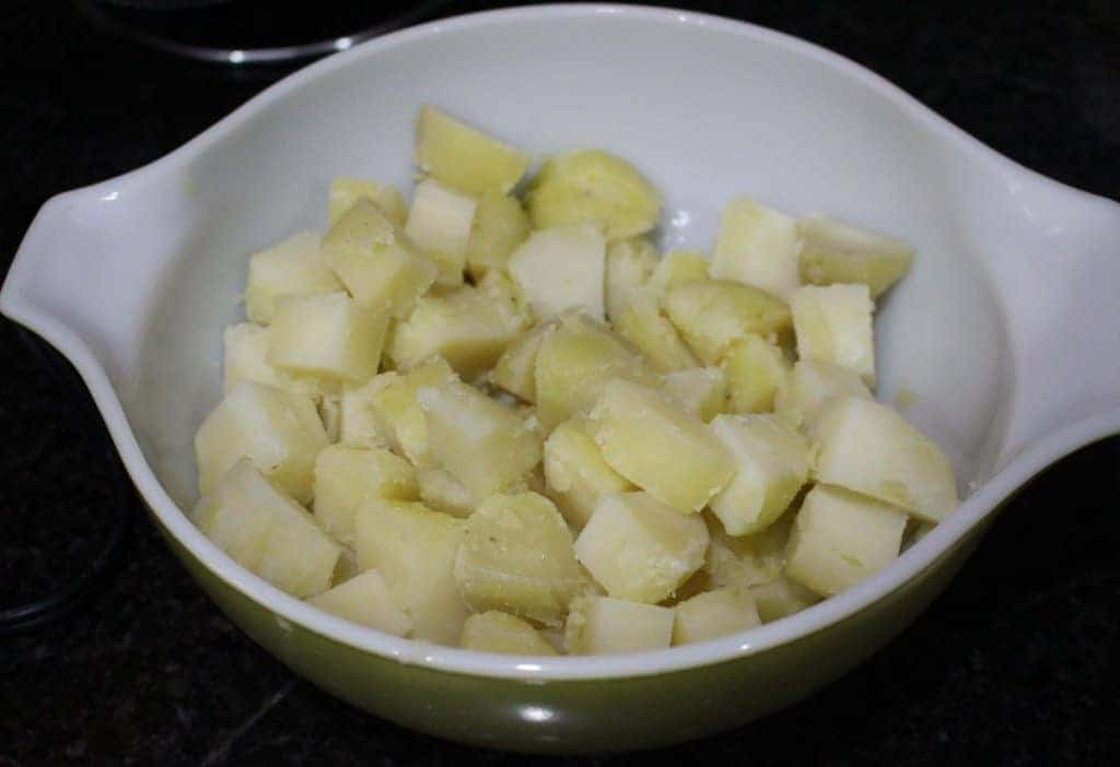 boiled and peeled potato in a bowl