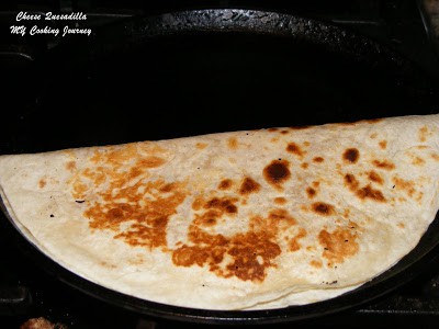 Folding the tortilla and press it