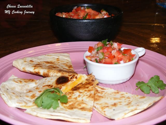 Simple Cheese Quesadilla garnish with cilantro