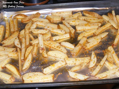 Layering the potatoes in a tray