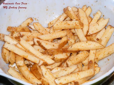 Adding the herb mixture to the potatoes