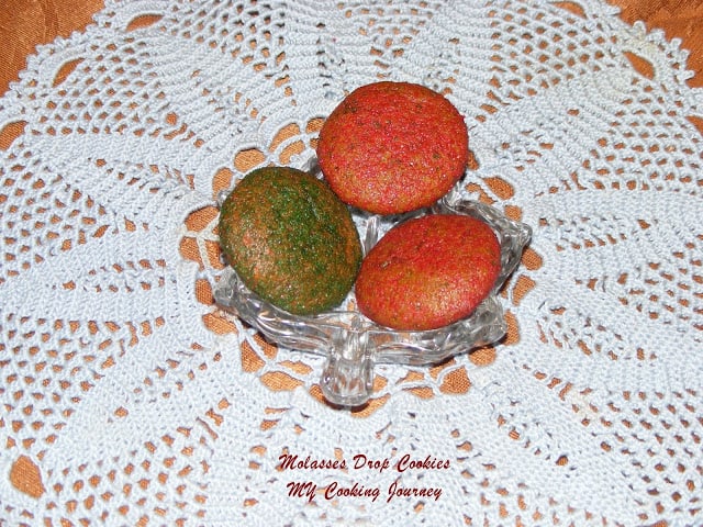 3 Molasses drop cookies in a glass bowl