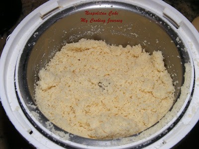 Almond powder in a grinder
