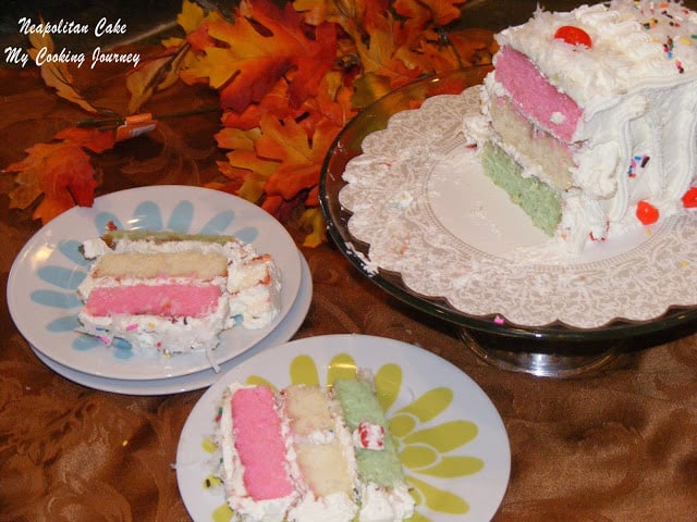 Festive Holiday Cake sliced in different plates