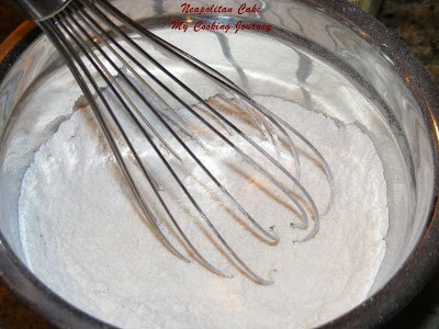 Whisking flour with whisk