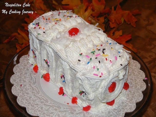 Neapolitan Cake decorated with sprinkles