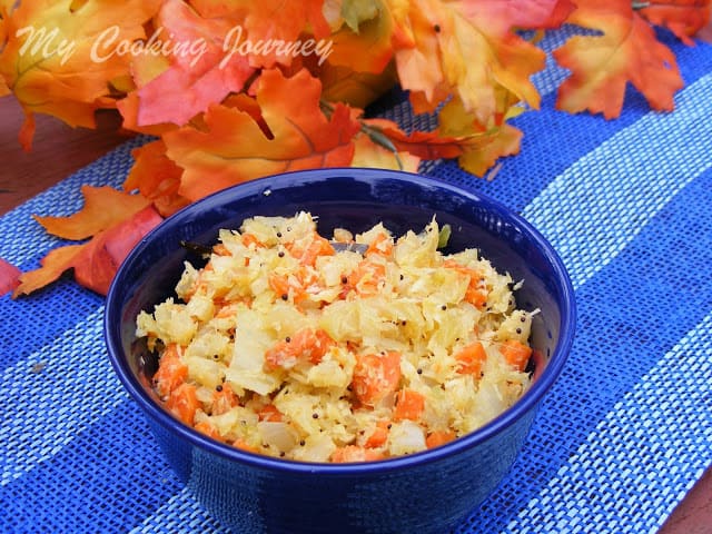 Carrot Cabbage curry in a blue bowl