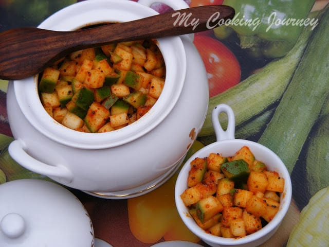 Menthiya Mangai Urugai in a white jar and white cup.