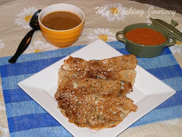 Rava Dosai served in a plate with sambhar