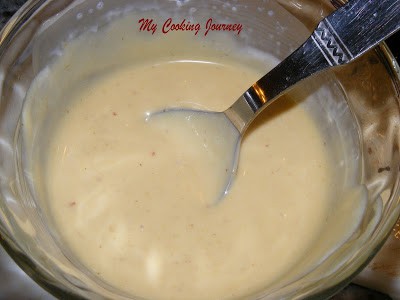 Combine the mustard with heavy cream in a bowl.