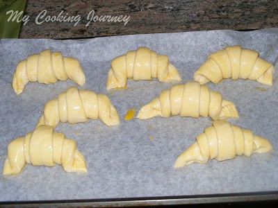 shaped croissant in the tray ready to be baked