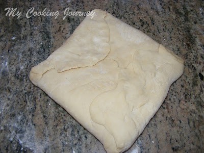 sealing the dough with butter inside