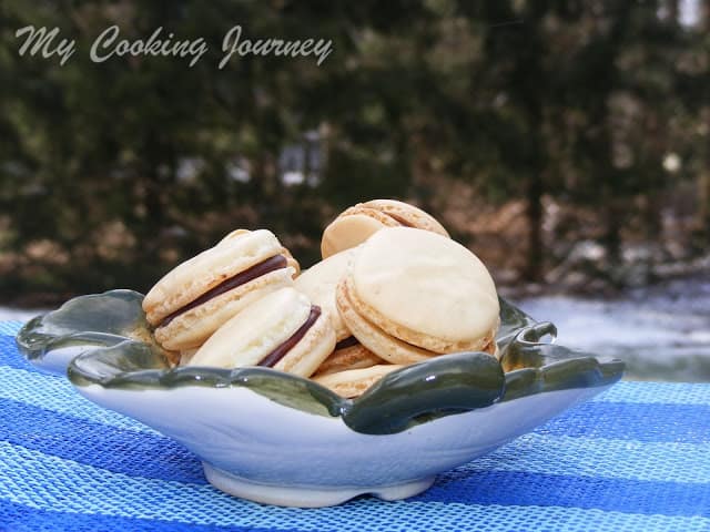 French Macarons with Chocolate Ganache  in a bowl