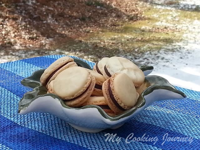 French Macarons with Chocolate Ganache in a Bowl