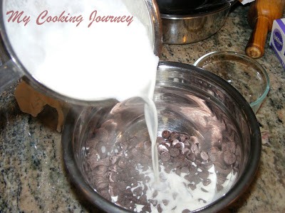 Adding the butter into chocolate bowl