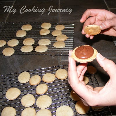 French Macarons with Chocolate Ganache in a wirerack