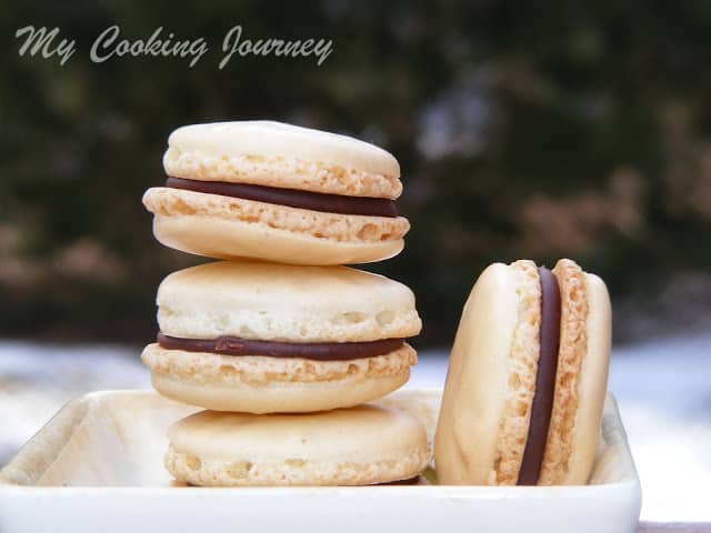 French Macarons with Chocolate Ganache in a Tray