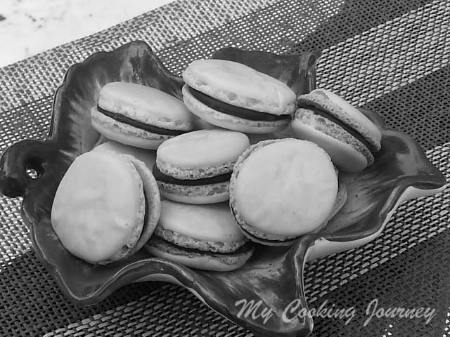 French Macarons with Chocolate Ganache in a Bowl