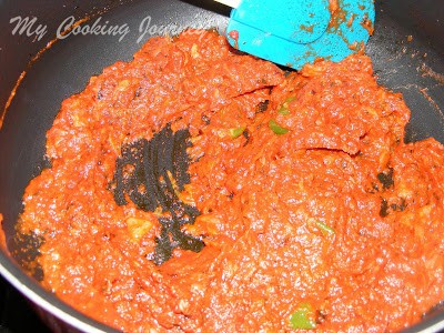 Adding tomato in simmering it.