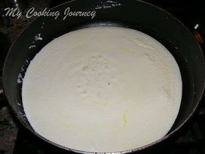 Ricotta liquid cooking in pan
