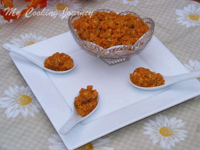 Carrot halwa is ready and served in a flower bowl