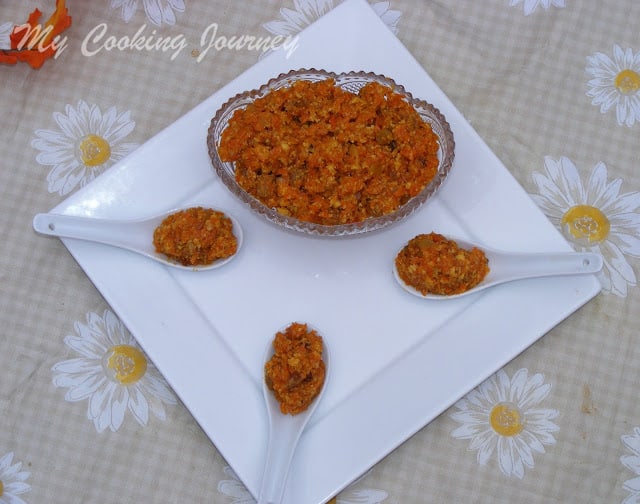 Carrot halwa in a dish and spoon