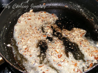 Frying the nuts in the pan