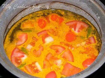 Pineapple rasam cooking in Bowl