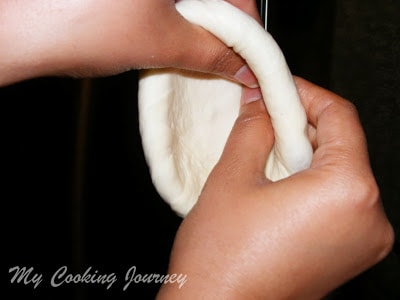 Shaping the Bialys dough.