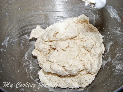 Making dough flour in a bowl.