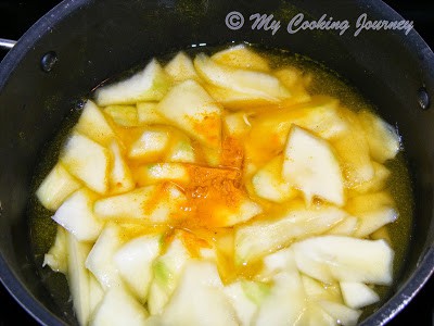 Mango cooked with turmeric