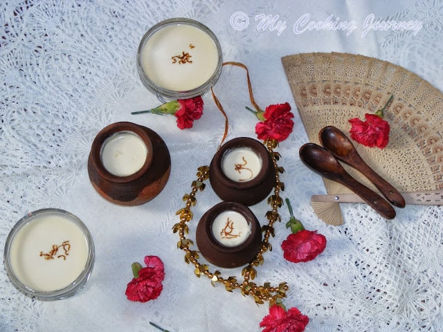 Mishti Doi decorated with flowers.