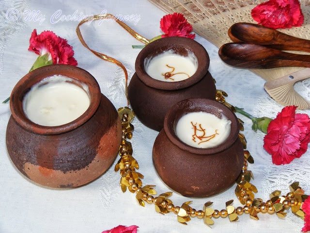 Mishti Doi in mud pots with beautiful decoration.