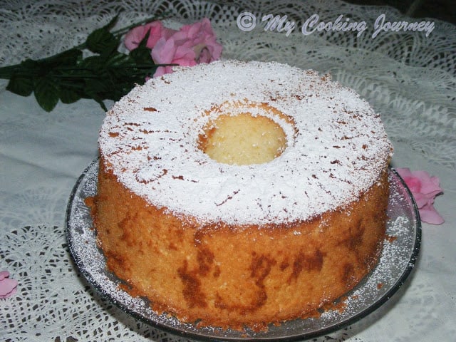 Place the cake on the serving tray and dust with confectionery sugar.
