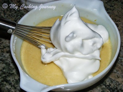 Use folding motion to mix the egg whites.