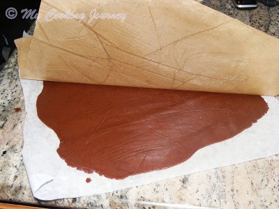 Rolling the brown dough