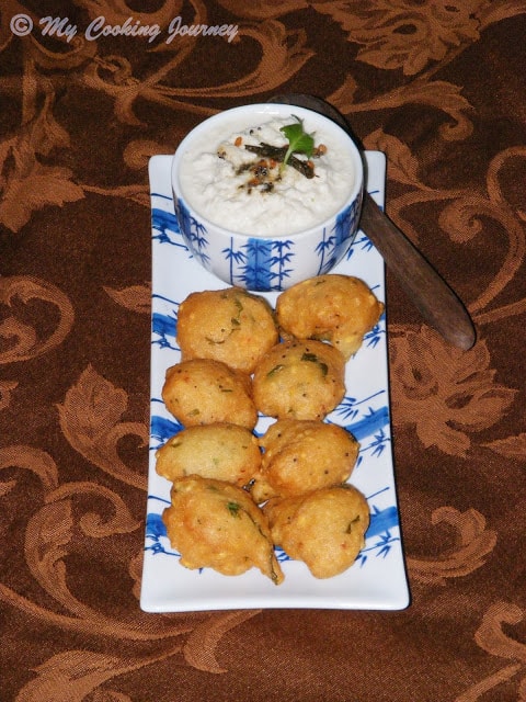 Lentil Fritters with Coconut Chutney in a dish.